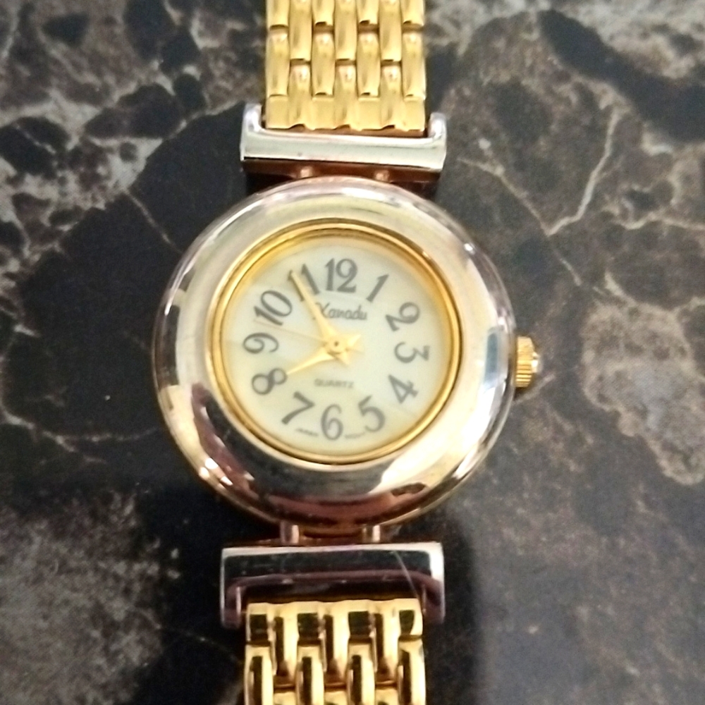 Vtg. Xanadu Gold tone w/ mother of pearl face Japan Movt. Ladies watch